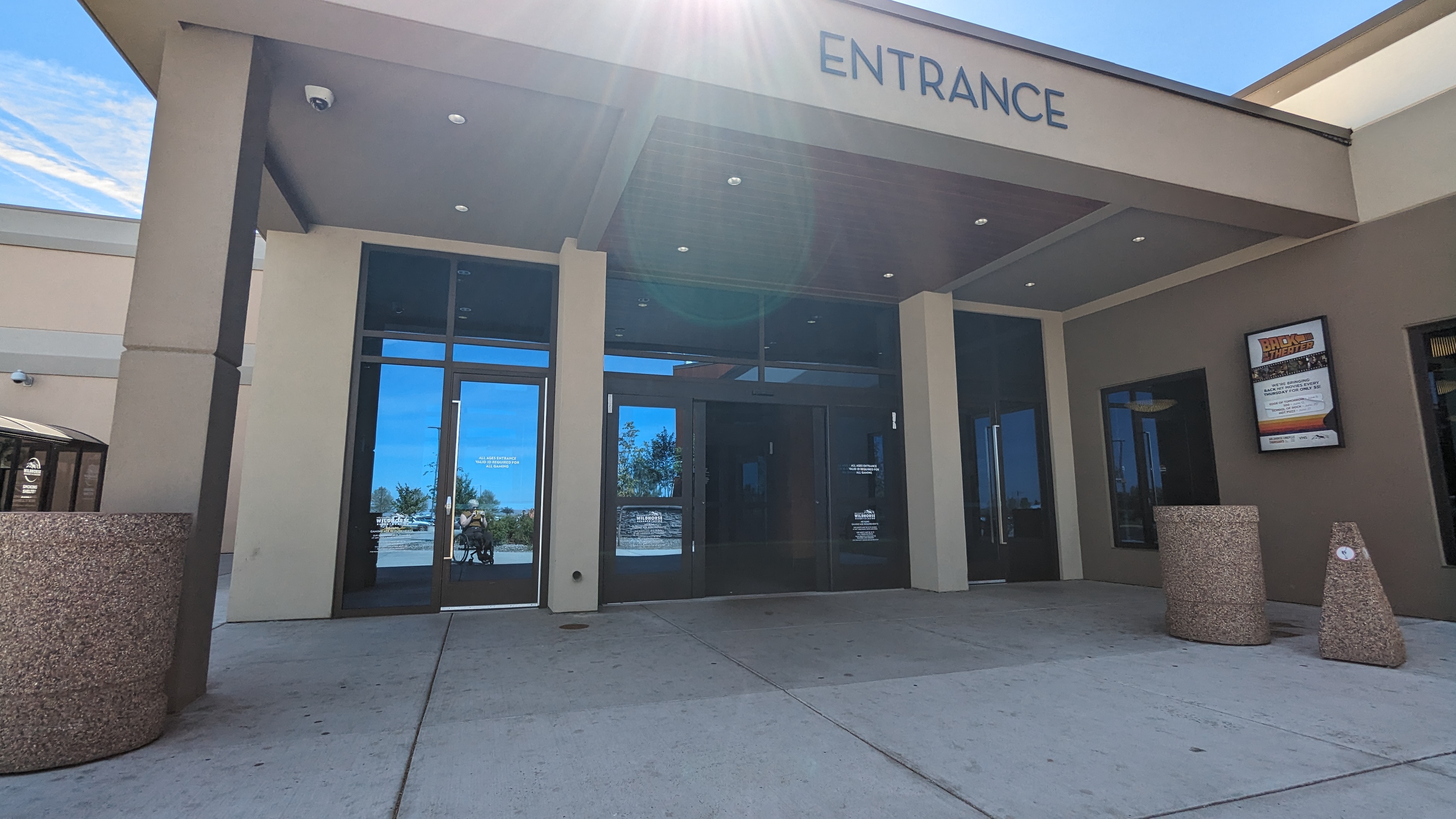 Entrance with ADA door button on left