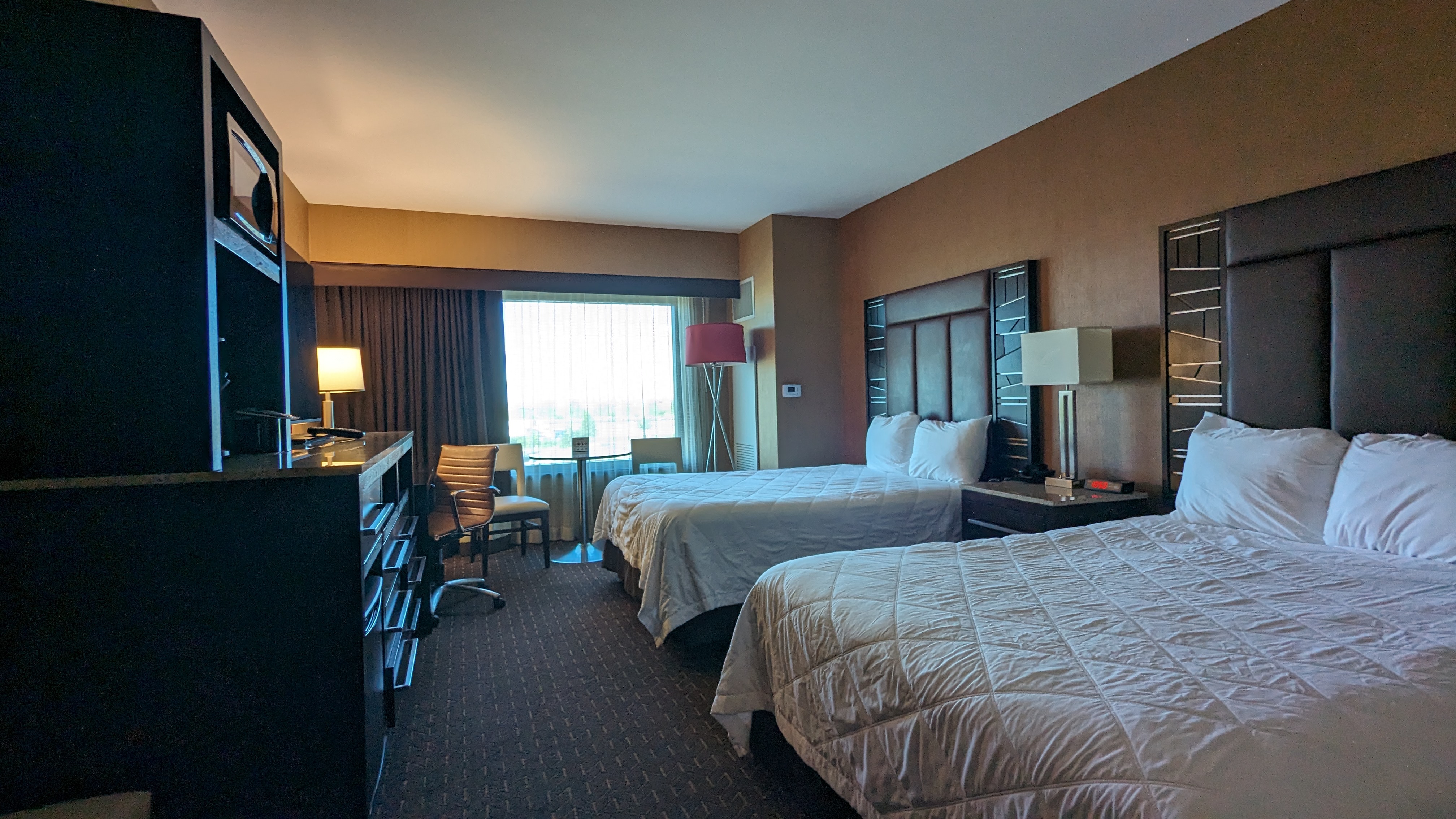 Standard Hotel room layout, ADA rooms have lower microwave and a few more inches between beds, visual emergency notifications.