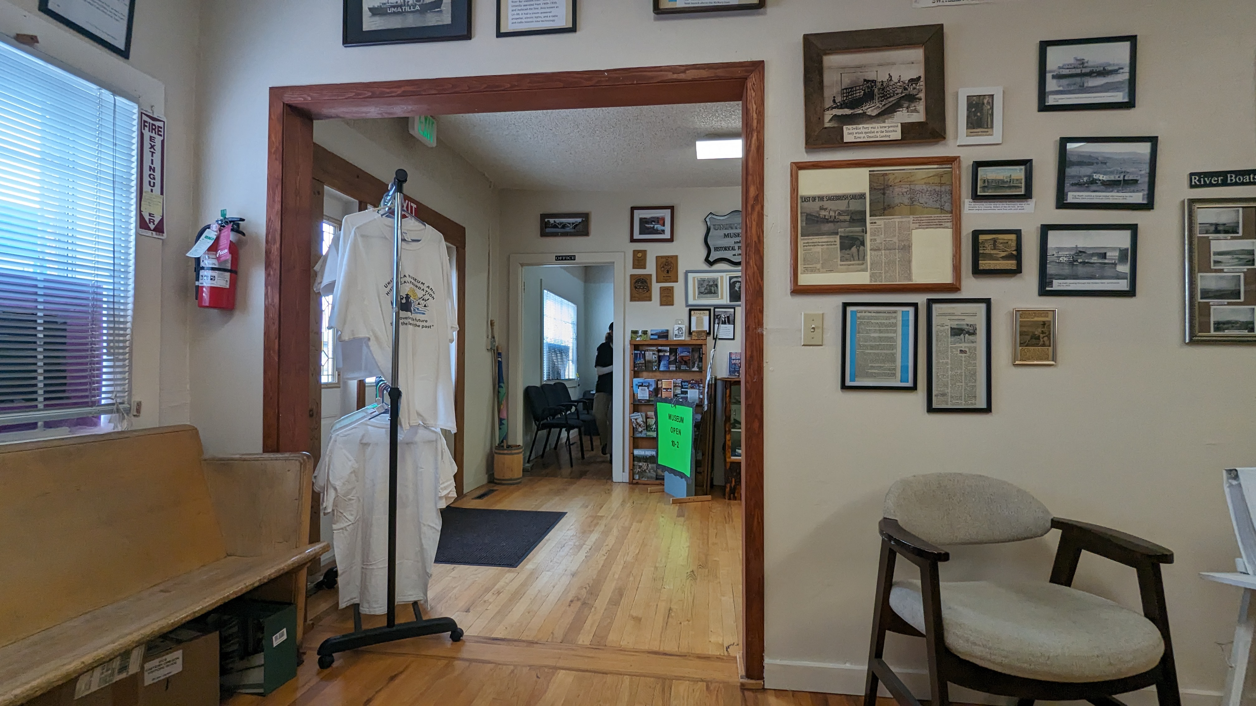 Side room showing entry way leading to front office in view of front door.